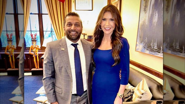 Kash Patel and Kristi Noem smiling together