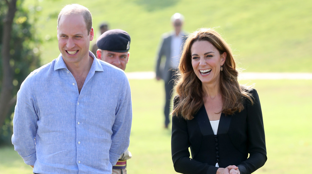 William and Kate smiling outdoors