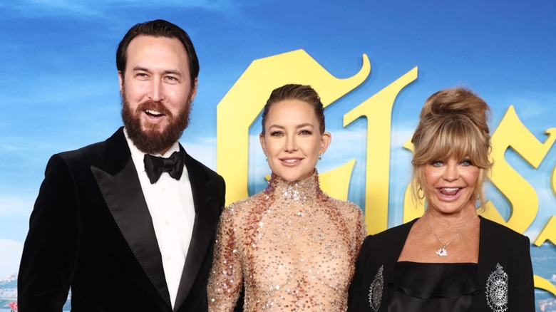 Danny Fujikawa, Kate Hudson, and Goldie Hawn posing together at an event in 2022