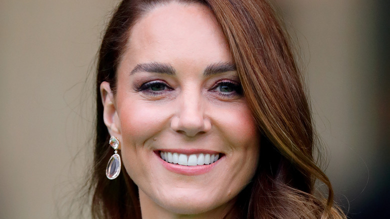 Kate Middleton smiling for photo