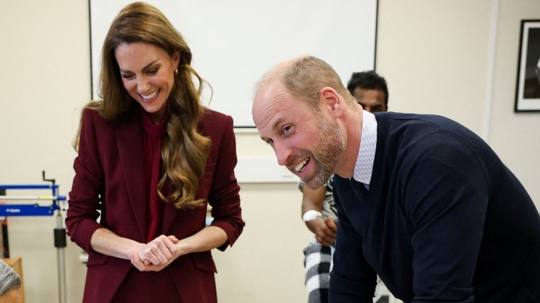 Kate Middleton and Prince William speak to a patient in Charing Cross Hospital in London, England (2026)