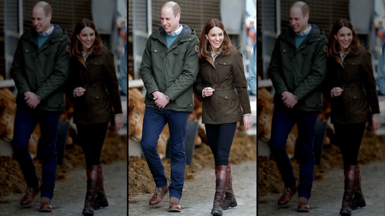 Kate Middleton and Prince William in jeans and boots and army green jackets together outside