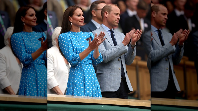 Kate Middleton and Prince William clapping hands outside at Wimbledon