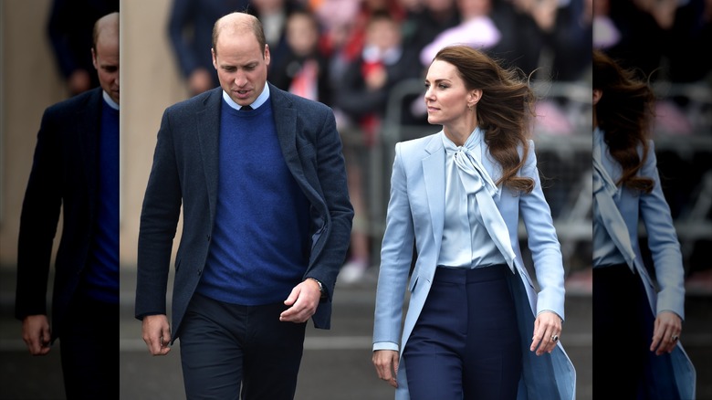 Prince William in shades of blue and Kate Middleton in shades of blue while walking outside in Ireland