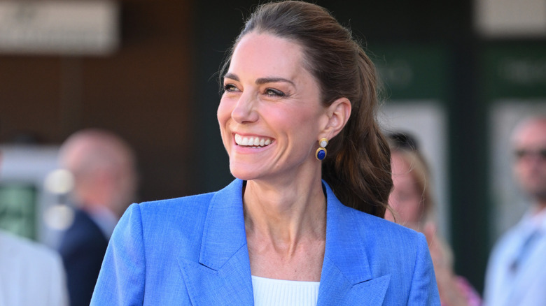 Princess Catherine smiling in a blue blazer