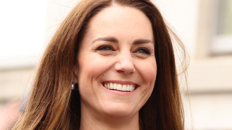 Kate Middleton smiling at event
