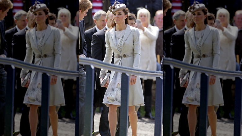 Princess Catherine wearing a light gray coat over a floral-print dress.