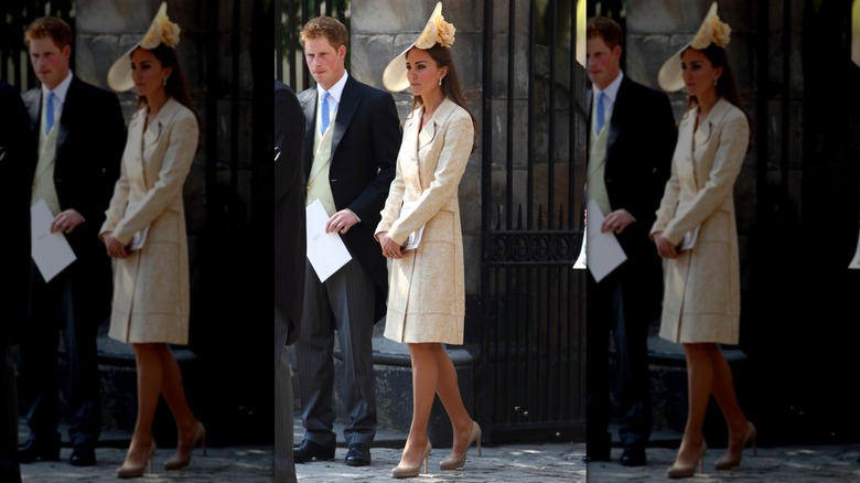 Princess Catherine standing beside Prince Harry.