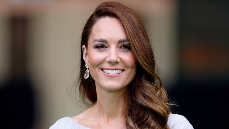 Kate Middleton poses for a photo.