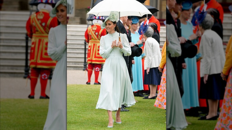 Kate Middleton eets with guests at a Royal Garden Party at Buckingham Palace in London on May 25, 2022.
