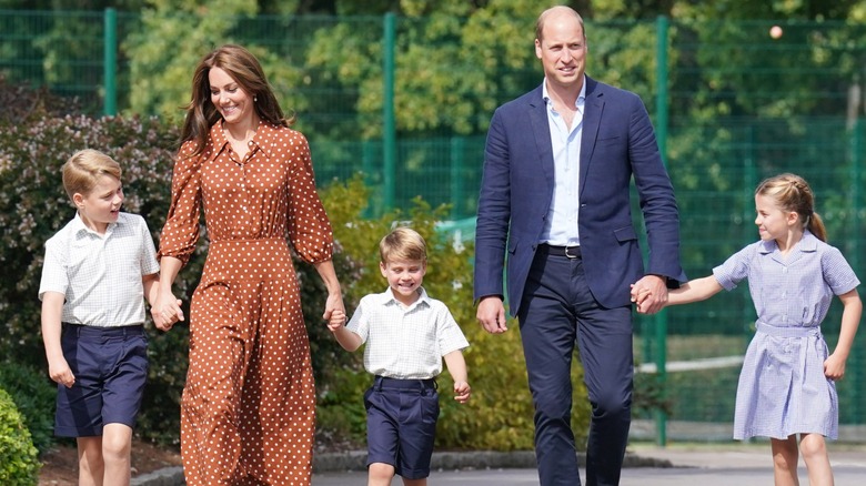 Prince George, Kate Middleton, Prince Louis, Prince William, and Princess Charlotte walking