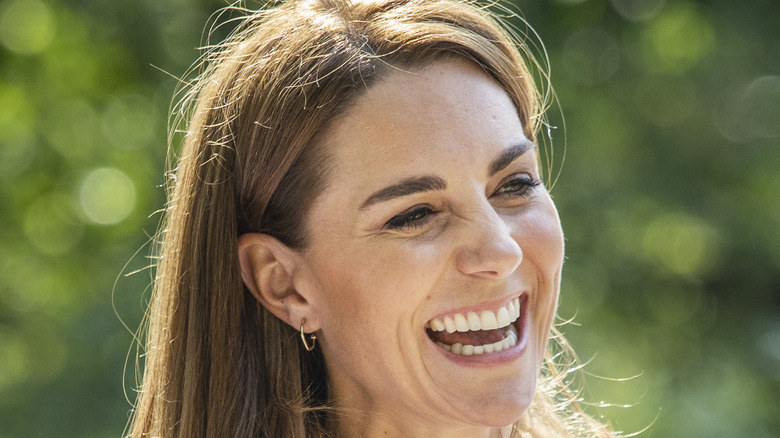 Kate Middleton smiling outside