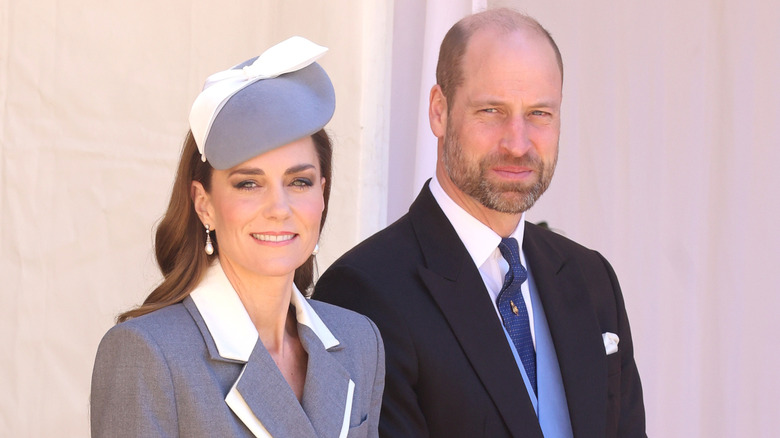 Kate Middleton and Prince William standing next to each other