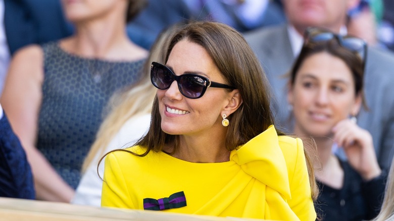 Kate Middleton smiling in sunglasses
