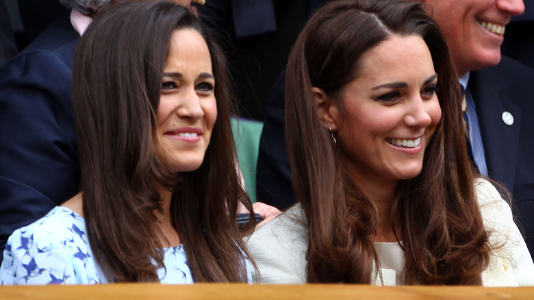 Pippa Middleton and Princess Catherine laughing together