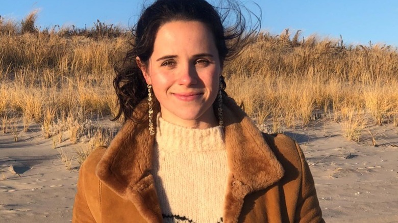 Carrie Monahan smiling on beach