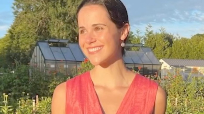 Carrie Monahan smiling outside