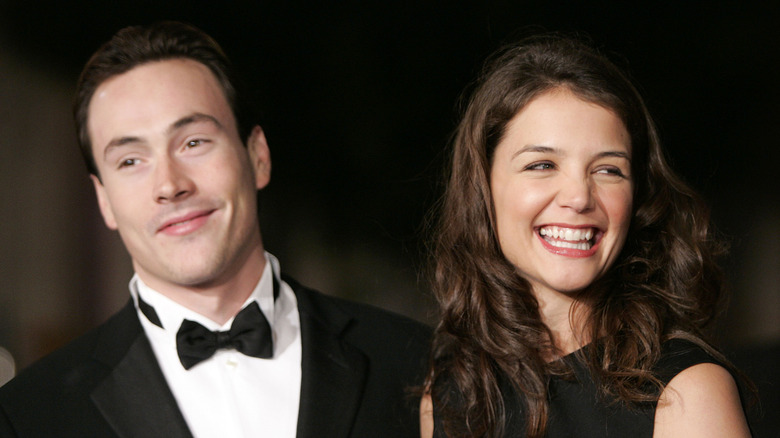Katie Holmes and Chris Klein smile at a red carpet event