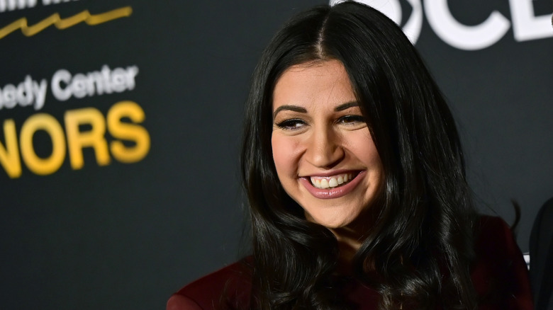 Katie Miller smiling at an event