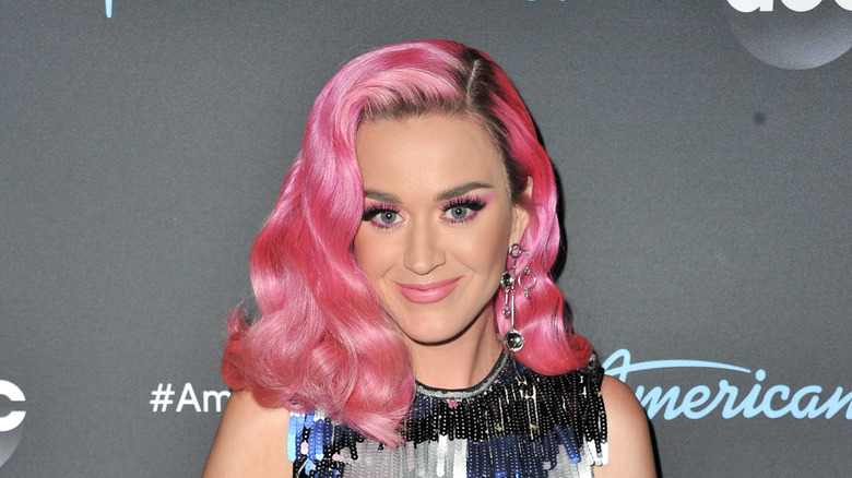 Katy Perry smiling with pink hair