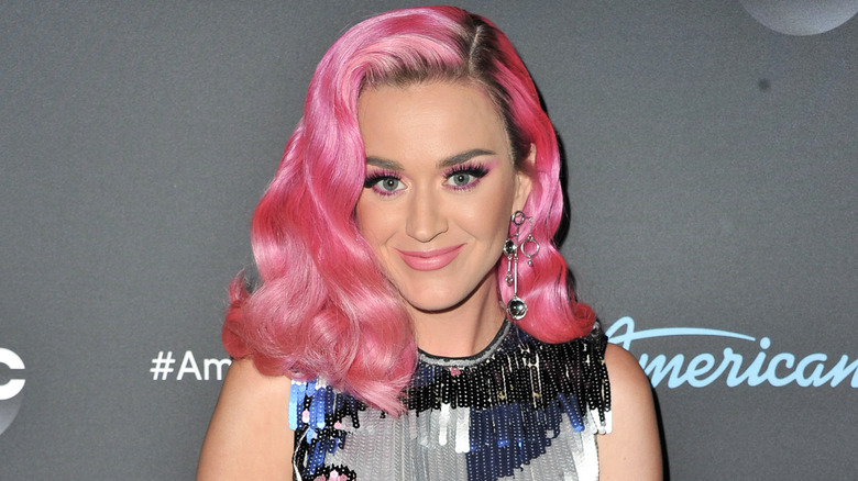 Katy Perry smiling with pink hair