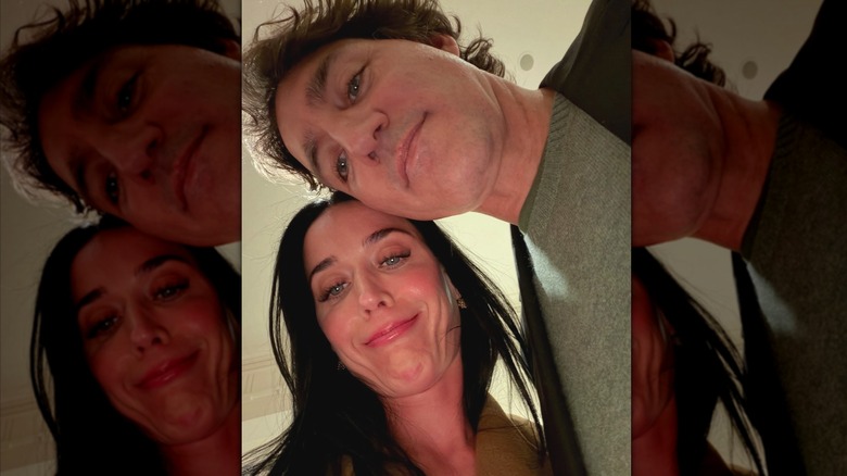 Katy Perry and Justin Trudeau take a selfie from an upward angle