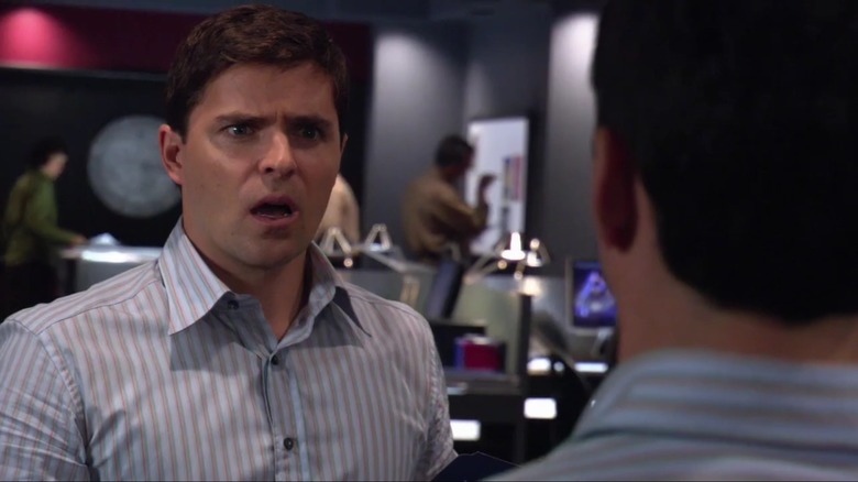 Kavan Smith looking at a duplicate of himself in shock on "The 4400"