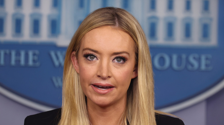 Kayleigh McEnany speaking with her long blond hair straightened and down