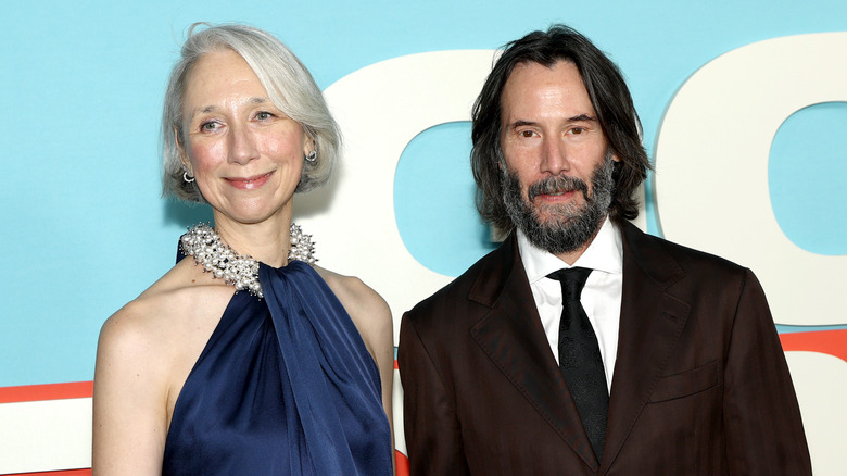 Alexandra Grant and Keanu Reeves posing