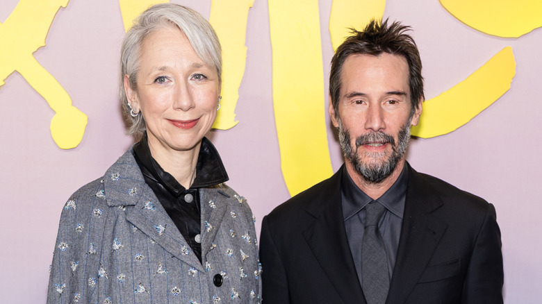 Alexandra Grant and Keanu Reeves posing
