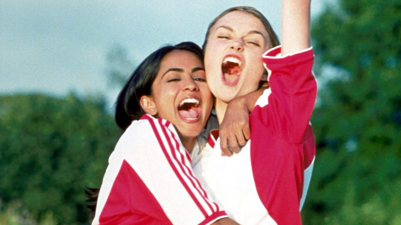 Parminder K. Nagra and Keira Knightley's characters celebrating in 'Bend It Like Beckham'