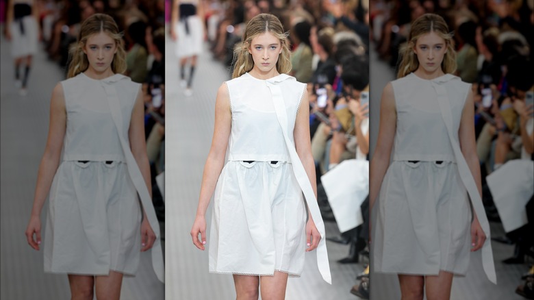 Sunday Rose Kidman Urban walks the runway for Miu Miu in white dress