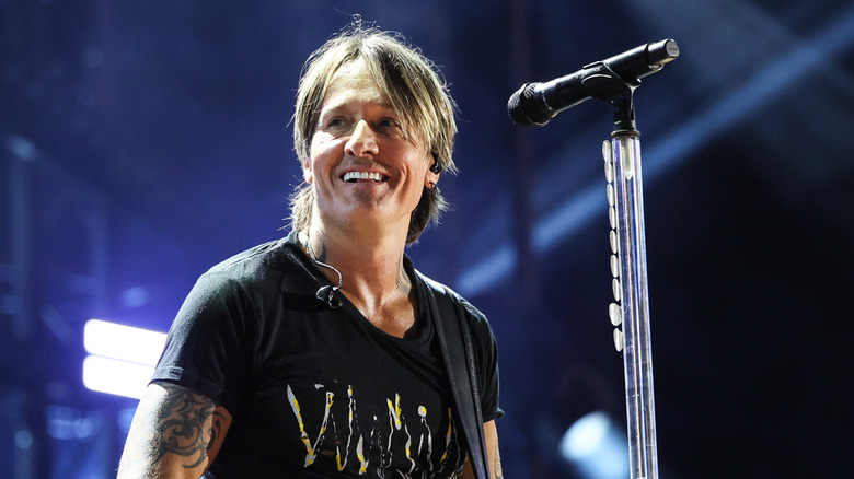 Keith Urban performing on stage