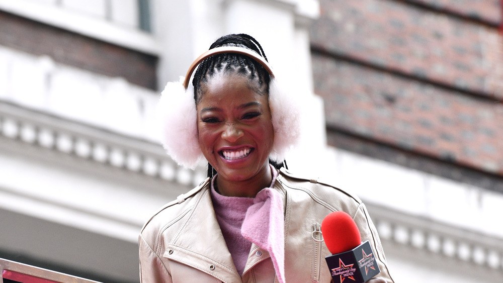 Keke Palmer in pink earmuffs