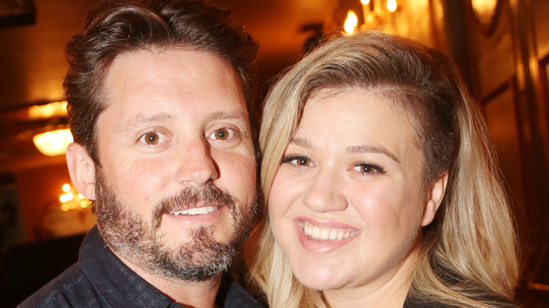 Brandon Blackstock and Kelly Clarkson smiling