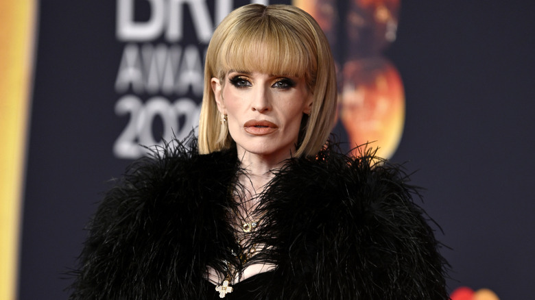 Kelly Osbourne posing on the red carpet at the 2026 BRIT Awards