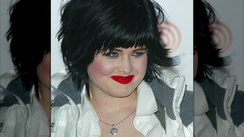 Kelly Osbourne with messy red lipstick