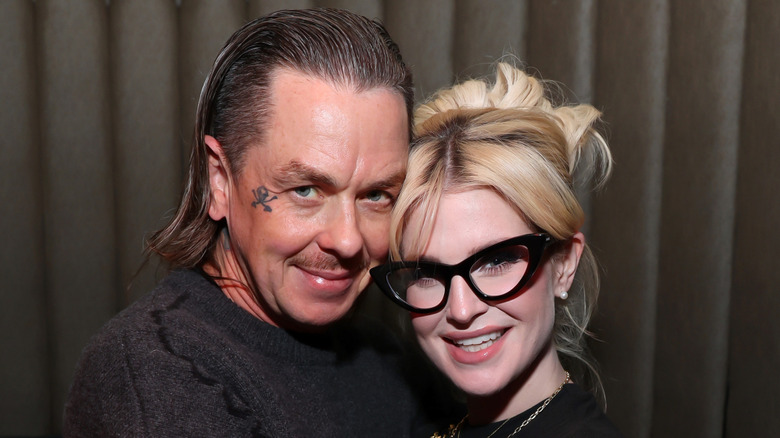 Sid Wilson and Kelly Osbourne smiling