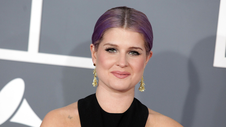 Kelly Osbourne at a red carpet event in 2013