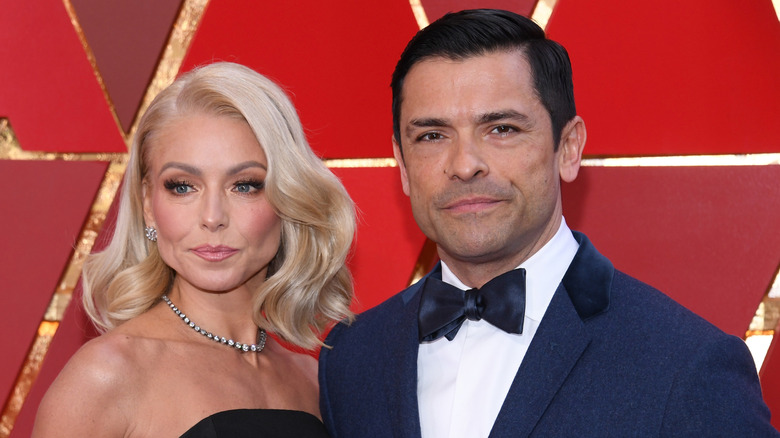 Kelly Ripa and Mark Consuelos posing together