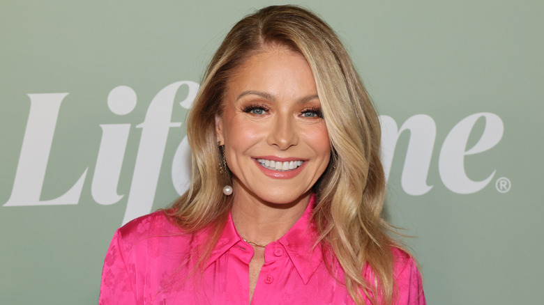Kelly Ripa wearing bright pink in 2023