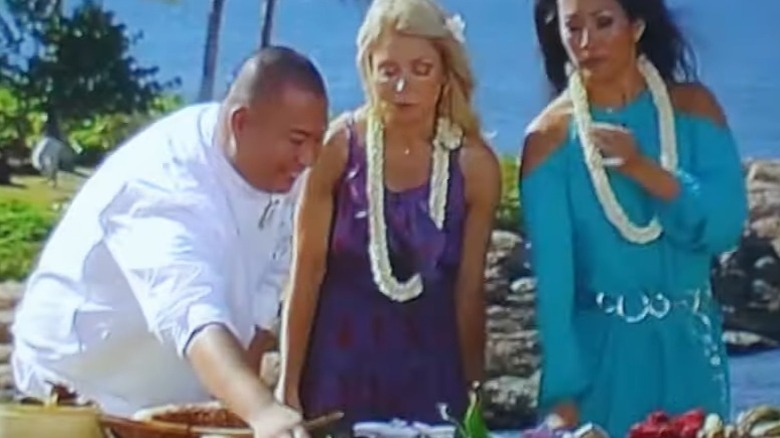 Kelly Ripa adjusting skirt while cooking