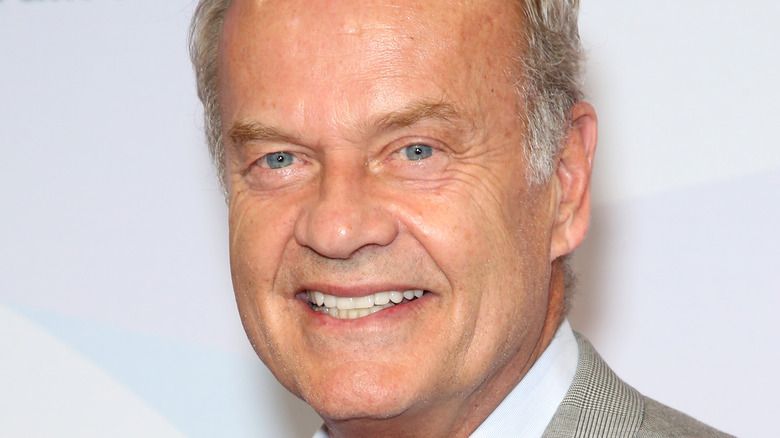 Kelsey Grammer smiles on the red carpet.