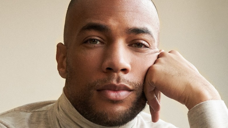 Kendrick Sampson hand on face