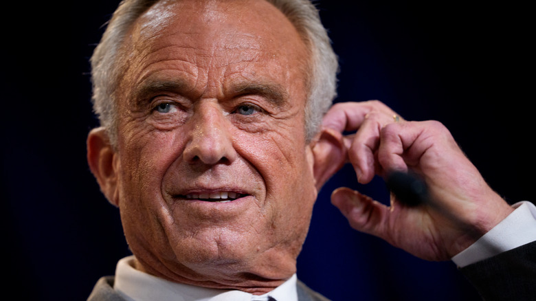 Closeup of RFK Jr. tugging his ear