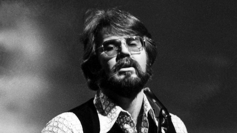 Kenny Rogers performing onstage in 1970.