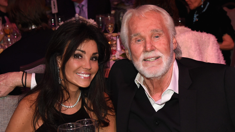 Wanda Miller and Kenny Rogers smiling in 2016.