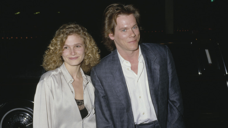Kyra Sedgwick and Kevin Bacon in front of a limo at the 1988 Golden Globes