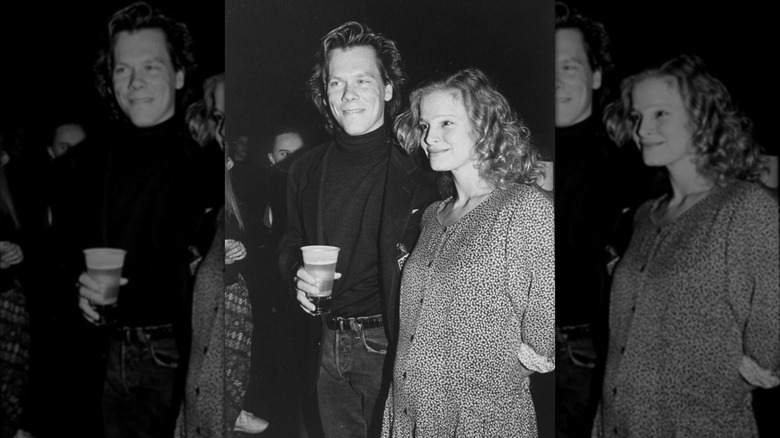 Kevin Bacon and Kyra Sedgwick in black and white smiling