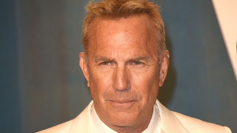 Kevin Costner smirking